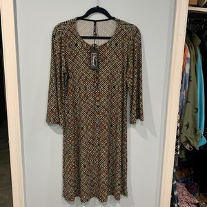 Vierock dress. Bell 3/4 sleeve  bow  in front with opening.   Not worn